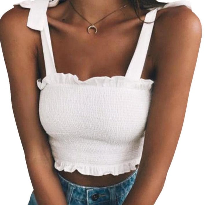 A girl wearing a strapped top 